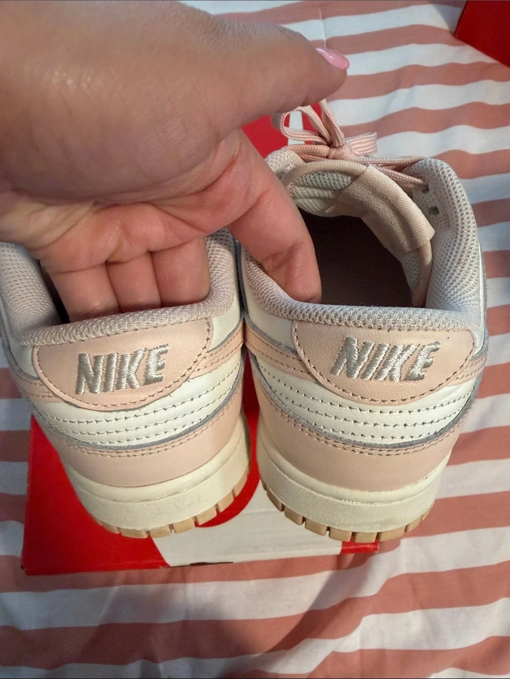 Nike Women’s Dunk Low Sneakers in Sail Orange Pearl